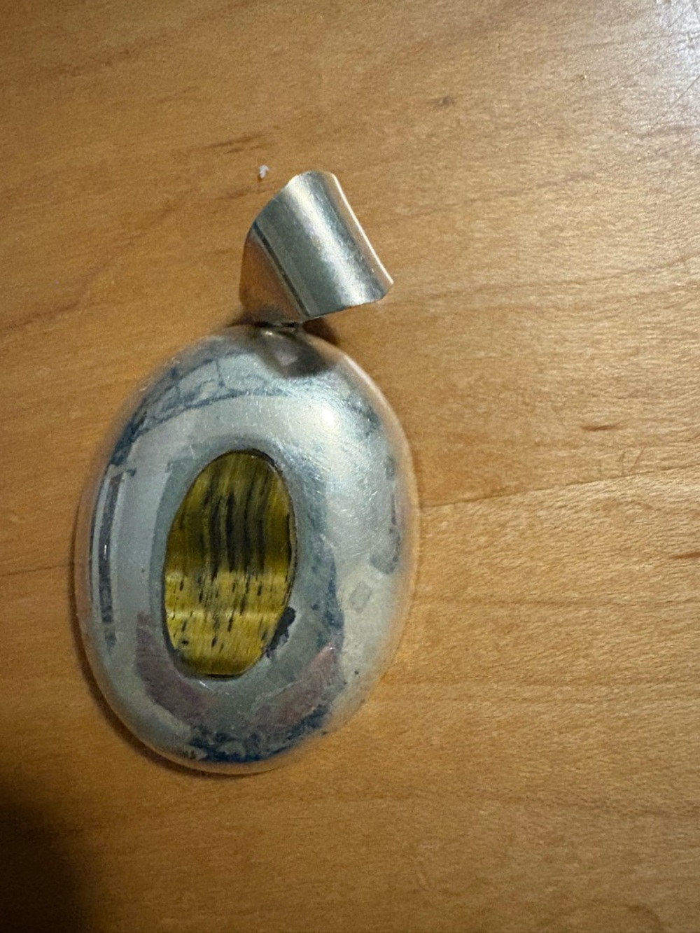Sterling silver tigers eye pendant see marking on back